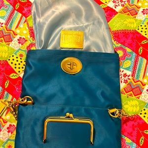 This is an authentic coach clutch bag